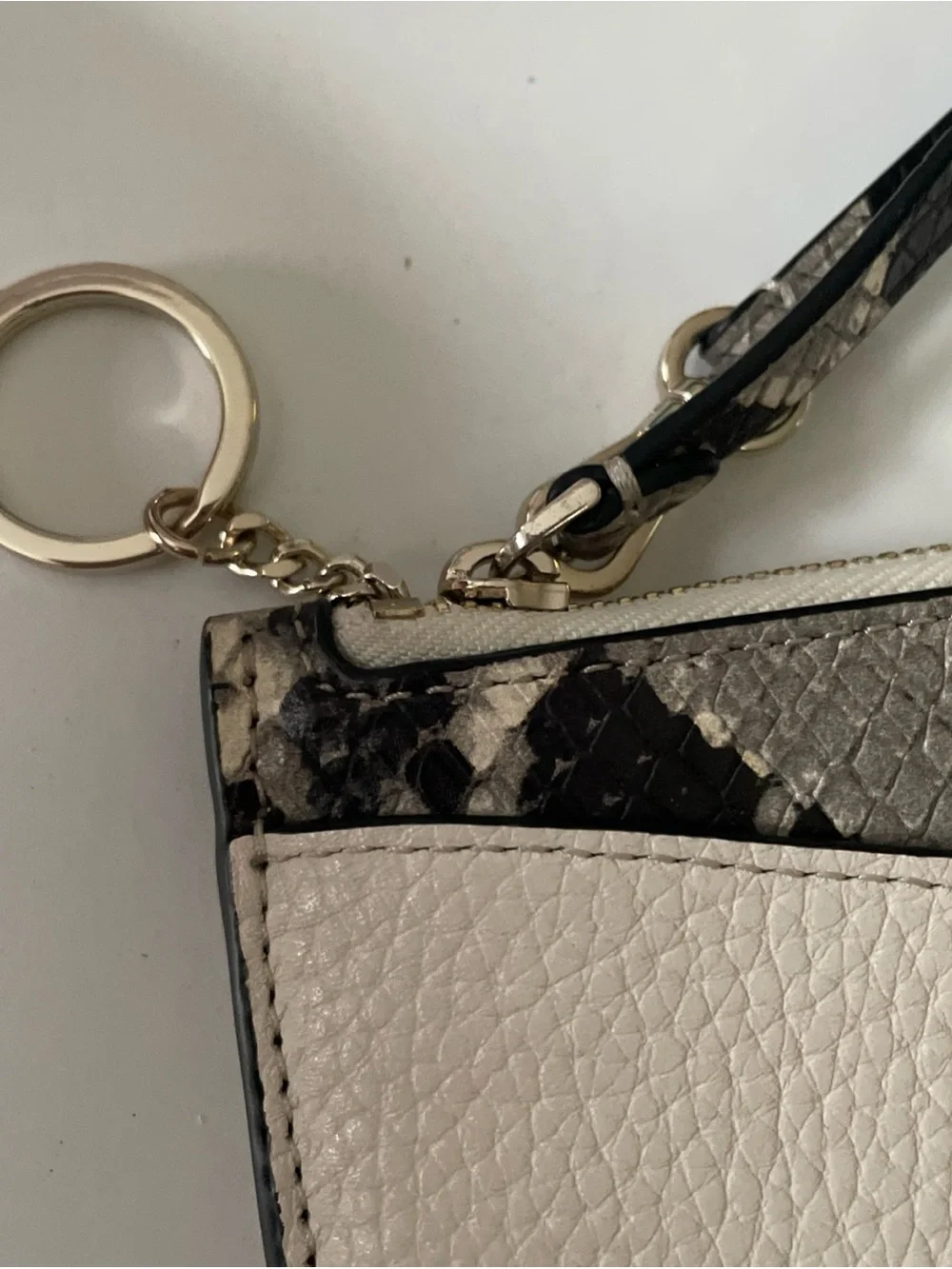 kate spade Cream Pebbled Wristlet with Snake-Print Trim